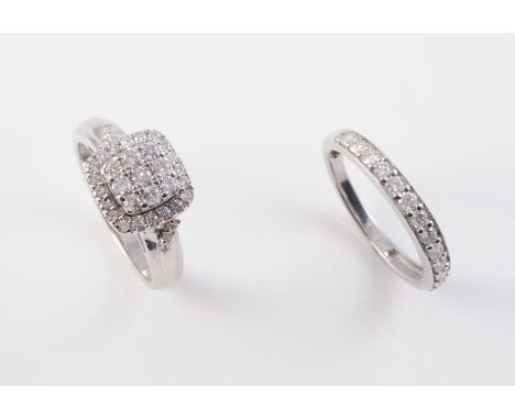 A 9CT WHITE GOLD AND DIAMOND WEDDING SET, the engagement ring set to the square shaped mount with nine uniform brilliant cut 