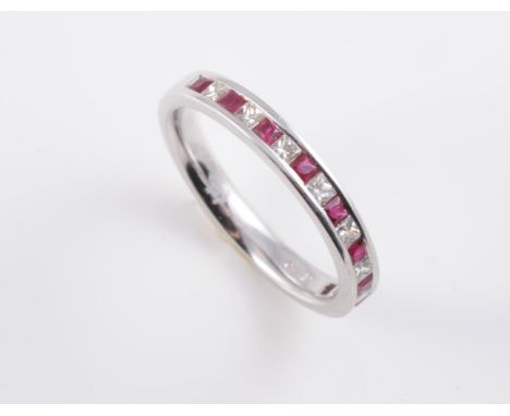 AN 18CT WHITE GOLD, RUBY AND DIAMOND RING, the nine square cut rubies alternately spaced with eight square cut diamonds, all 