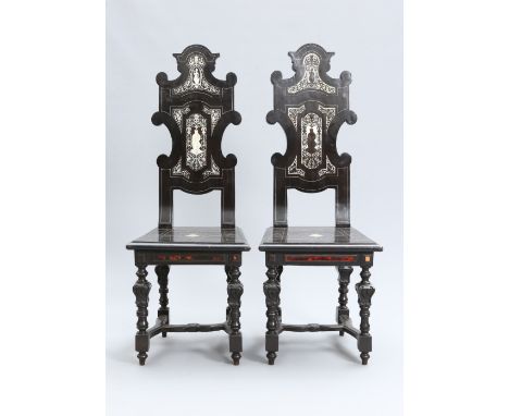 A PAIR OF 17TH CENTURY STYLE ITALIAN IVORY, SCARLET TORTOISESHELL AND EBONISED HALL CHAIRS, 19TH CENTURY, each shaped back wi