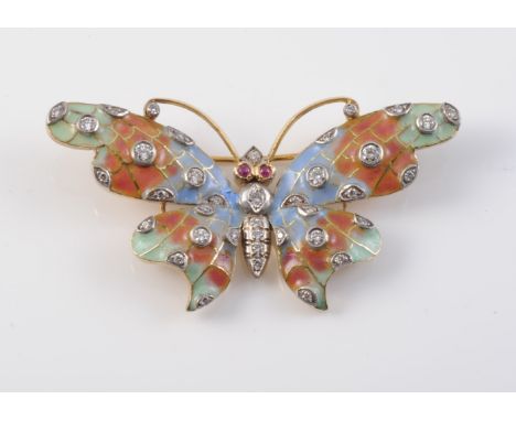 AN ENAMEL AND DIAMOND BROOCH, modelled as a butterfly, set throughout with symmetrically set blue, red and green enamelling a