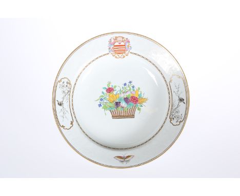 A SPODE STONEWARE PLATE, CIRCA 1820, finely potted, the centre painted with a basket of colourful summer flowers, the border 