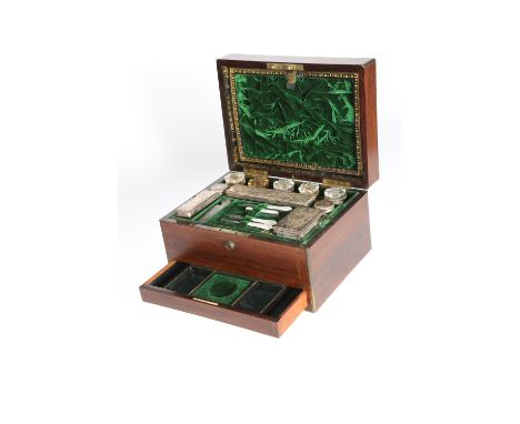 AN IRISH BRASS-MOUNTED ROSEWOOD DRESSING CASE, MID 19TH CENTURY, label of Austins, St. Andrew Street, Dublin, the interior ap