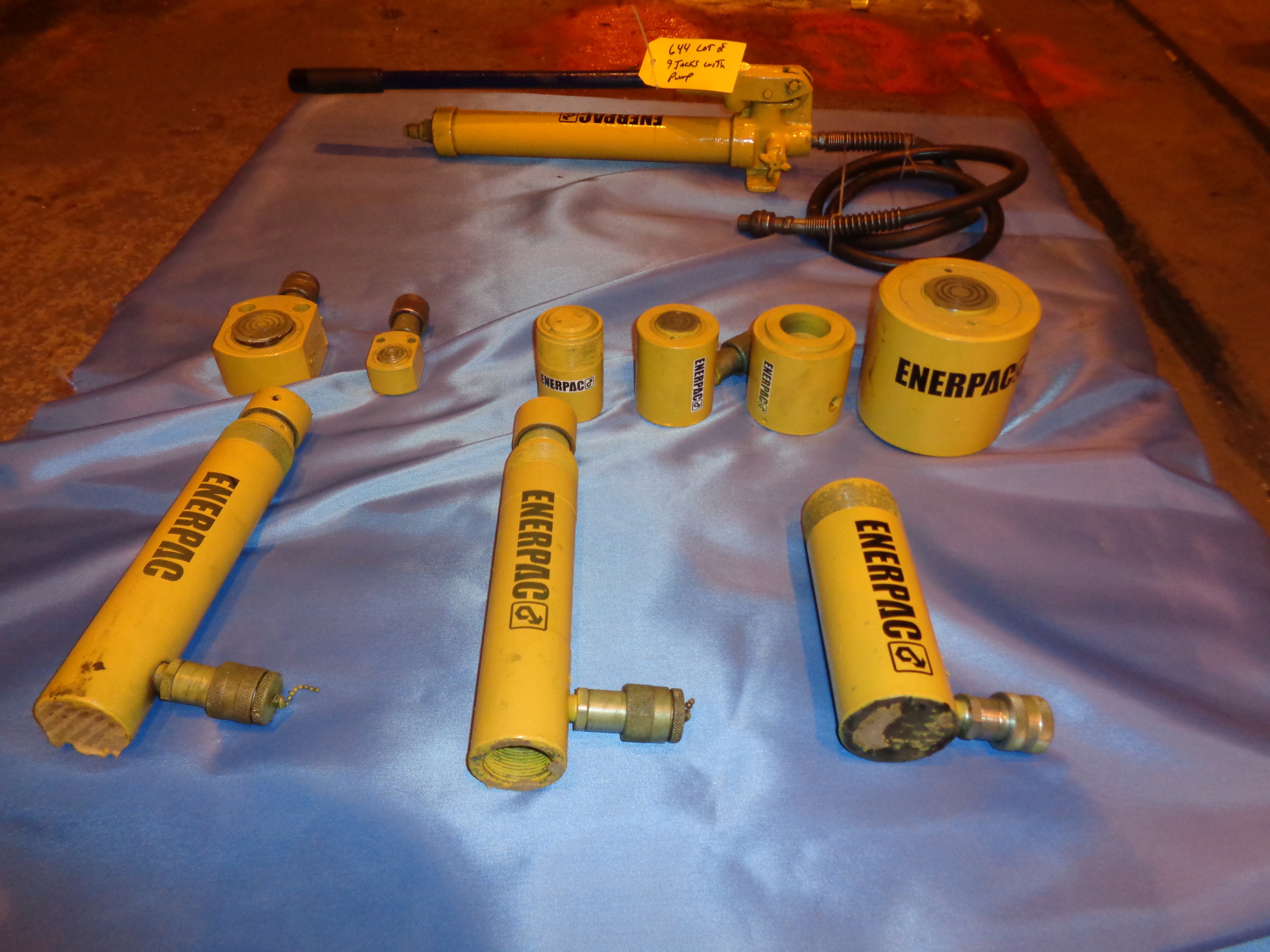 (9) Enerpac Jacks with Enerpac Pump *** All Items Need to Be Paid by
