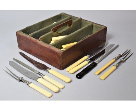 A Vintage Four Section Stained Pine Canteen Box Containing Various Bone Handled and Other Knife and Part Carving Sets 