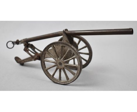 A Vintage Brass and Metal Toy Cannon, 25cm Long 