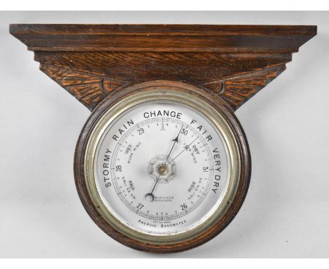 An Art Deco Wall Hanging Oak Framed Circular Aneroid Barometer, 28cm Wide 