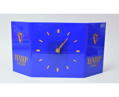 A Shelf Mounting Harp Lager Clock with Battery Movement, 36cm wide 