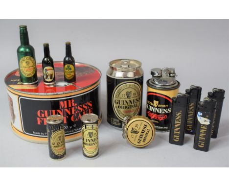 A Tin Vintage Guinness Tin Containing Various Guinness Pocket and Table Lighters (We Can Not Post this Lot) 