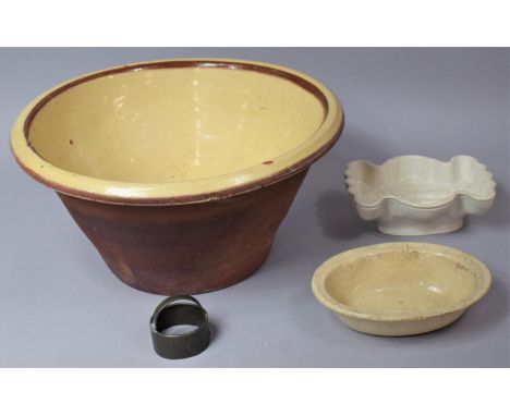 A Large Glazed Terracotta Bowl (Hairline) Together with Jelly Moulds and a Vintage Cutter 