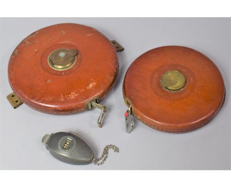 Two Mid 20th Century Leather Cased Tape Measures by Rabone and a Push Button Counting Device 