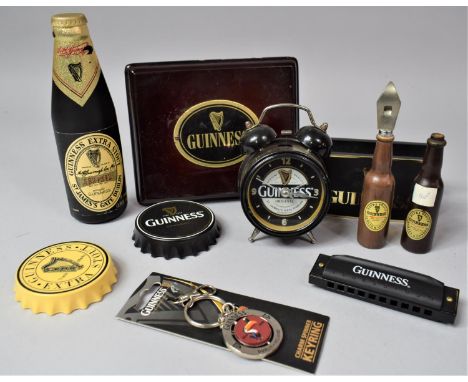 A Collection of Guinness Novelties to Include Bottle Openers, Alarm Clock, Key Ring etc 