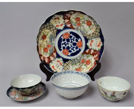 An Imari Patterned Japanese Plate, Oriental Jug, Three Tea Bowls and a Dish 