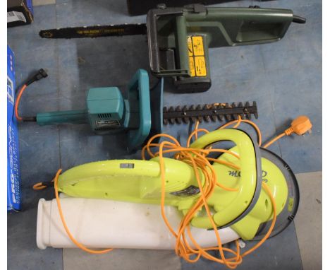 An Electric Chainsaw, Hedgecutter and Garden Groom 