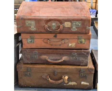 A Collection of Four Vintage Leather Suitcases 