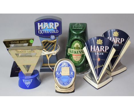 A Collection of Various Guinness and Harp Bar Beer Pumps and Signs 