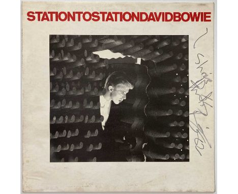 A copy of David Bowie - Station to Station (APL1 1327, glossy VG+ with wispy marks across both playing sides) signed to front