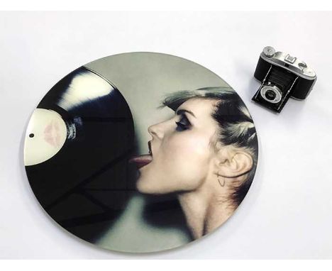 A circular photo print (50cm diameter) depicting an image of Debbie Harry taken by Martyn Goddard. This example is a 1/1 and 