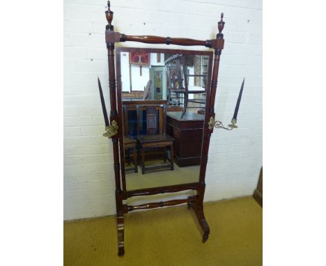 A Regency mahogany cheval mirror on triple ring turned supports and stretchers with brass candle sconces - Height 1.64 m x Wi
