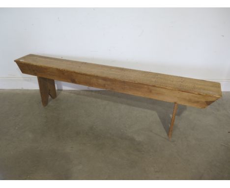 A 19th century stripped pine bench 1.77m long x 22cm deep x 46cm tall
