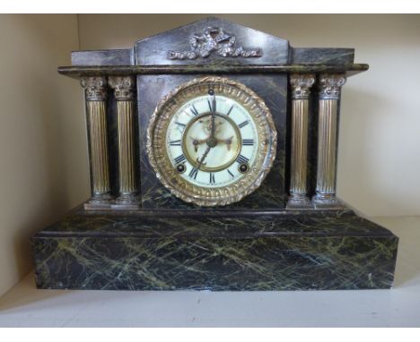 A 19th century Ansonia American mantel clock eight day movement, strikes on gong
Condition report: with key and pendulum