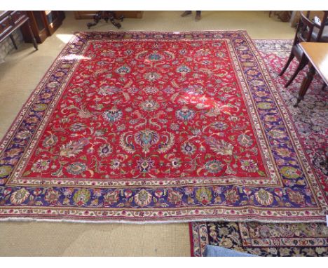 A red ground fine handmade Persian Tabriz carpet - 3.70 m x 3.21 m