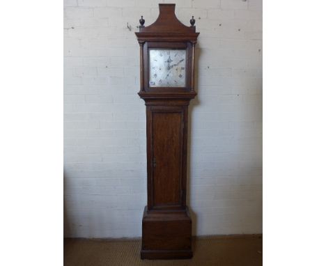 An oak thirty hour longcase clock with a pagoda top and posted frame movement and probably later silvered 11" dial - signed J