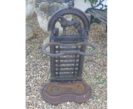 A black metal stick stand - 84cm high