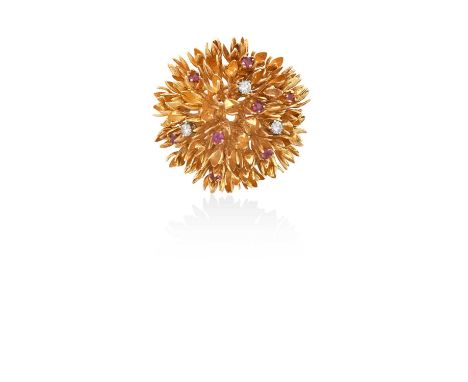 A Ruby and Diamond Brooch, by Tiffany &amp; Co.in the form of a stylised flower, the yellow textured leaves set throughout wi