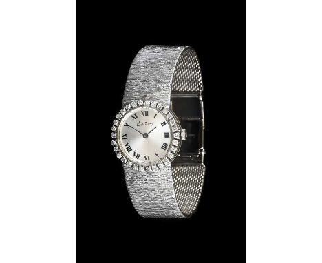 Kutchinsky: A Lady's 18 Carat White Gold Diamond Set Wristwatch, signed Kutchinsky, 1966, manual wound lever movement, silver