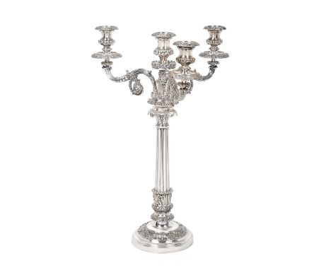 An Old Sheffield Plate Four-Light Candelabrum,  Apparently Unmarked, Circa 1820 on circular base with foliage and scroll bord