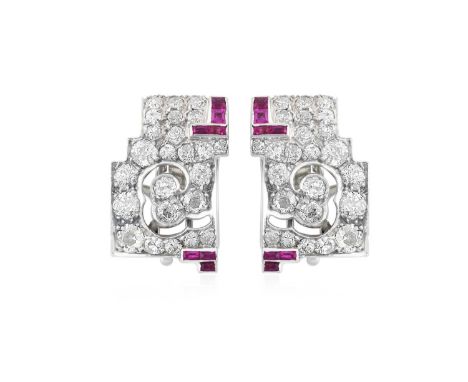 A Pair of Ruby and Diamond Clips of geometric design, set throughout with old cut and eight-cut diamonds with calibré cut rub