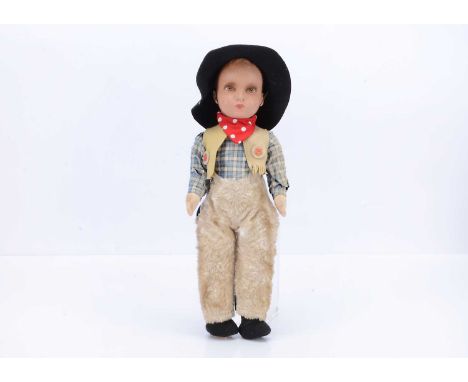 A post-war Dean’s Rag Book Co Buffalo Billy doll, circa 1951,  with painted composition head, impressed K, DRB Co. Ltd, brown