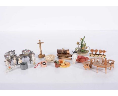 Various dolls’ house items,  a small scale set of Mexican soft metal furniture, a porcelain baby in a shoe, a wooden trough w