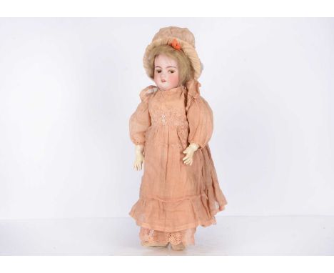 A Simon & Halbig 1039 DEP child doll, with brown flirty eyes, light brown cotton eyelashes, pierced ears, blonde mohair wig, 