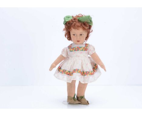 A Chad Valley Suzy doll, late 1930s,  with pressed felt face, brown painted side glancing eyes, reddish brown curly mohair wi