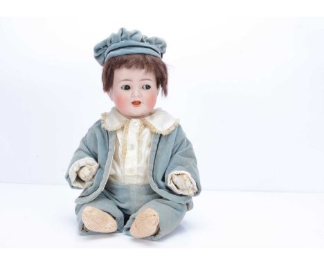A Kammer and Reinhardt for Simon and Halbig 126 character baby,  with brown flirty sleeping eyes, brown mohair wig, compositi