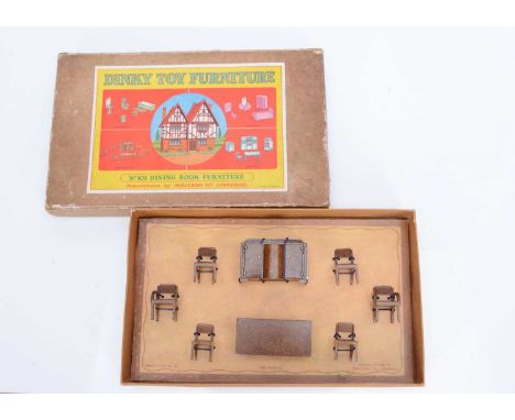 A pre-war Meccano Dinky Toy Dolly Varden No.101 Dining Room,  diecast metal table, sideboard and six chairs, in original box 