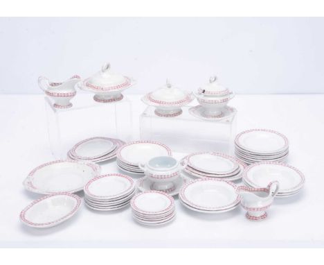 A late 19th century ‘Best L.P.R? Co’ dolls’ dinner service,  with deep red transfer printed border, comprising two sets of th