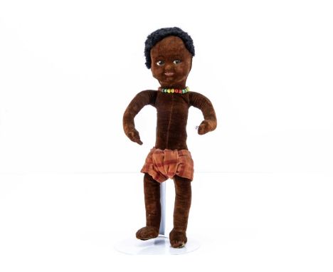 A Dean’s Rag Book Co black velvet doll,  of brown velvet with black wool hair, painted eyes, swivel head, wired limbs, orange