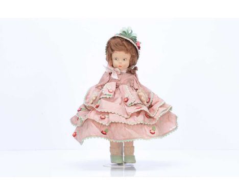 A Lenci style felt doll, 1930s, with pressed felt face, brown painted side glancing eyes, synthetic brown wig, swivel head, j