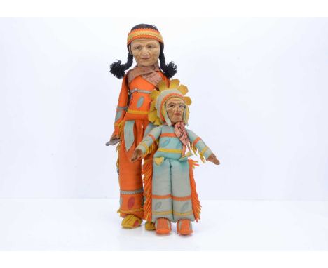 Two Norah Wellings Native American Indian dolls, 1930s,  both with press brown velvet faces with painted features, brown felt