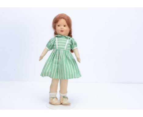 A Chad Valley girl doll, late 1930s,  with pressed cloth face, brown painted side glancing eyes, brown mohair wig, swivel hea