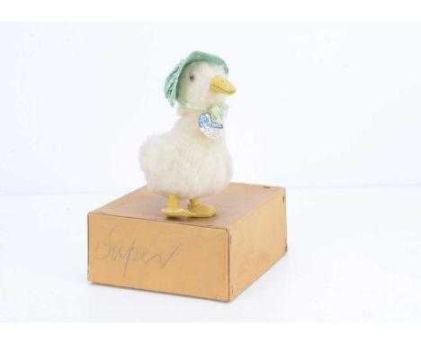 A Chad Valley Mother Goose pantomime toy, 1937-38, of white wool plush, orange and black glass eyes, yellow beak and feet, or