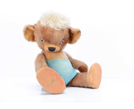 A rare large Merrythought Punkinhead teddy bear, circa 1951,  with brown mohair, clear and black glass eyes with white painte