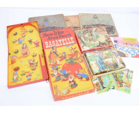 Snow White toys, a Chad Valley Bagatelle —18 ½in. (47cm.) long; three 78rpm records, in original sleeves (one record damaged 