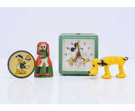 Walt Disney and Ub Iwerks toys, a Mickey Mouse Ingersoll alarm clock with green painted metal case —4in. (10cm.) high; a Flip