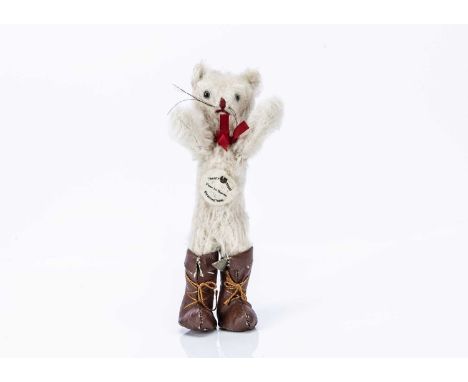A rare Puss in Boots pantomime toy, probably Farnell, circa 1932, of white mohair, clear and black glass eyes, red stitched n