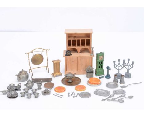Dolls’ house kitchen,  a 19th century pine kitchen dresser —6in. (15cm.) high, a gilt metal floor gong (missing striker), a p