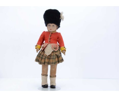 A Chad Valley Highlander boy soldier, 1930s,   with pressed felt head, inset blue and white glass eyes, swivel head, jointed 