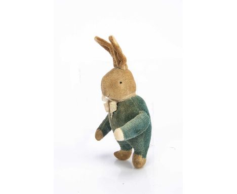 A rare British velvet rabbit, circa 1920,  with white velvet head, ears, hands and feet, black bead eyes, pink stitched nose 